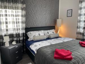 Posteľ alebo postele v izbe v ubytovaní Silver Gray Appartment + 24 fotografií