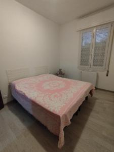 Ein Bett oder Betten in einem Zimmer der Unterkunft Da Silvana