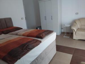 Postel nebo postele na pokoji v ubytování House apartments Ariamare + 37 fotografií