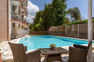 The swimming pool at or close to Harmony Apartments