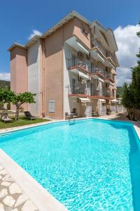 The swimming pool at or close to Harmony Apartments