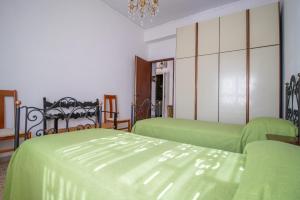 Posteľ alebo postele v izbe v ubytovaní Appartamento Centrale Panoramico