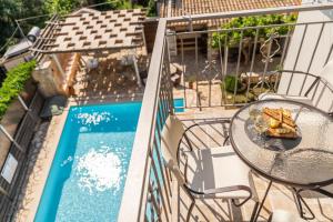 The swimming pool at or close to Harmony Apartments