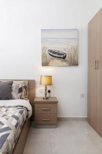 Voodi või voodid majutusasutuse Modern, Cosy 1BD Home - Close to Valletta toas