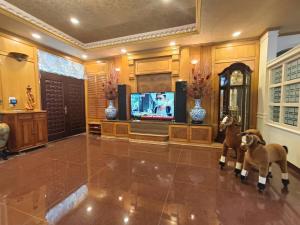 Foto sihtkohas Gongguan asuva majutusasutuse 金井灶之居民宿-雲端KTV-戶外烤肉區-溜滑梯盪鞦韆沙丘-電動麻將桌-switch-廚房可開伙-每日只接待一組客人 galeriist