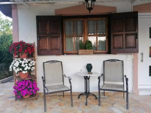 A balcony or terrace at Tota's Family House Még 37 kép