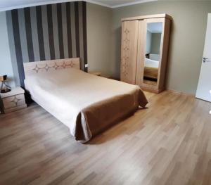 Кровать или кровати в номере gogoli family hotel