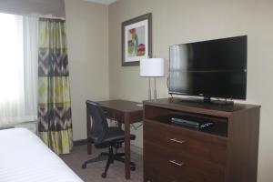 A television and/or entertainment centre at Meridian Inn & Suites Lloydminster