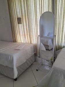 Postel nebo postele na pokoji v ubytování Sunset Guesthouse - Mthatha