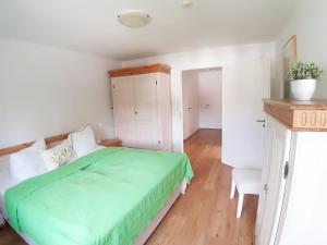 Postel nebo postele na pokoji v ubytování Ferienwohnung Schwalbennest