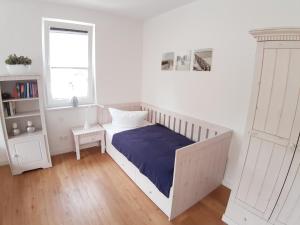 Postel nebo postele na pokoji v ubytování Ferienwohnung Schwalbennest