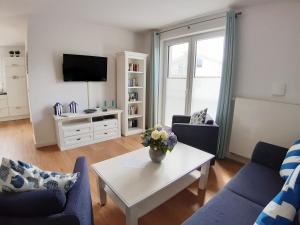 TV a/nebo společenská místnost v ubytování Ferienwohnung Schwalbennest + 5 fotografií