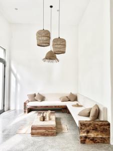 Posezení v ubytování La Grotta Hotel - Phu Quoc Emerald Bay