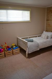 Letto o letti in una camera di Sandcastle by the Sea - a cosy holiday home