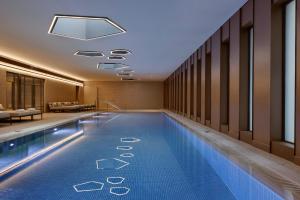 a swimming pool in a hotel room at Theatron Jerusalem Hotel & Spa MGallery Collection in Jerusalem
