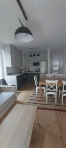 A kitchen or kitchenette at Apartament Zielona Zatoka