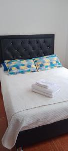 Postel nebo postele na pokoji v ubytování Dulce hogar baño compartido