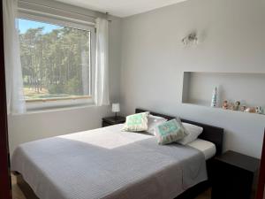Postel nebo postele na pokoji v ubytování Komfortowy Apartament w Blue Mare + 33 fotografií
