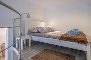 Posteľ alebo postele v izbe v ubytovaní Casa Iaia