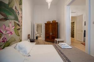 Posteľ alebo postele v izbe v ubytovaní Casa Iaia