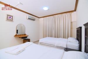 Sedrah Hotel客房内的一张或多张床位