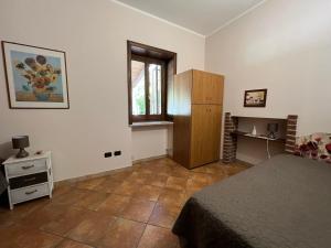 Postel nebo postele na pokoji v ubytování B&B EMPIRA Lamezia Terme