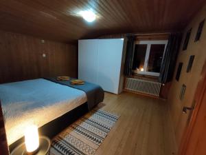 Postel nebo postele na pokoji v ubytování Grazioso appartamento a Li Curt (Poschiavo)