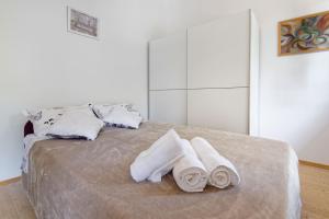 Łóżko lub łóżka w pokoju w obiekcie Holiday Homes Sunny Twins by Rent Istria