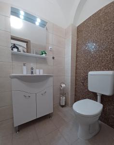 Kúpeľňa v ubytovaní RÁD-VÁR Apartmanház