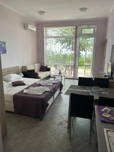 A bed or beds in a room at Villa Maria 2