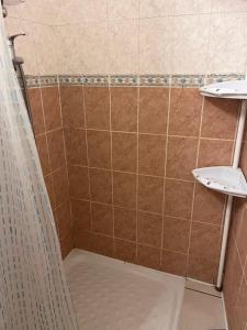 a bathroom with two sinks and a shower at A room and garden close to Paris in Vitry-sur-Seine +12 photos