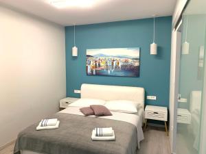 Postel nebo postele na pokoji v ubytování Deluxe Suites Mandić
