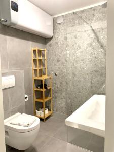 Koupelna v ubytování Deluxe Suites Mandić