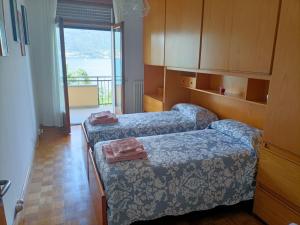 Llit o llits en una habitació de casa vacanza Tivàn 24 fotos més