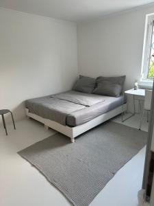 Postel nebo postele na pokoji v ubytování Casa Móre GRAY