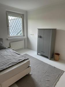 Postel nebo postele na pokoji v ubytování Casa Móre GRAY + 1 fotografie