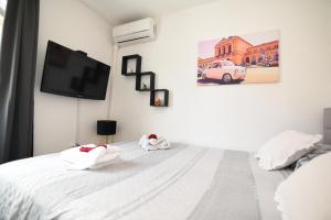 Posteľ alebo postele v izbe v ubytovaní GretaNola studio in Zagreb, parking, self check-in + 22 fotografií