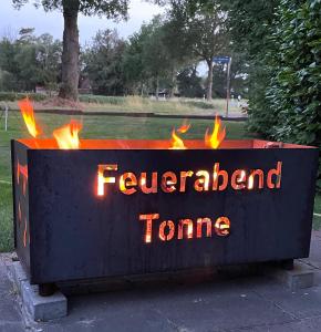 a sign that reads fire island torrance at Ferienhaus Becksvoort 49624 Löningen im Hasetal in Löningen