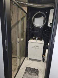 Koupelna v ubytování Apartament Konstytucji 3go Maja