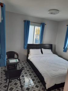 Postel nebo postele na pokoji v ubytování บ้านสวนปลายนา Ban suan pailna