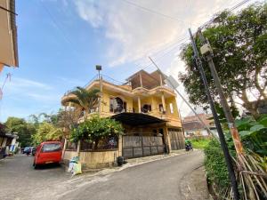 Το κτήριο όπου στεγάζεται  το δωμάτιο σε οικογενειακή κατοικία