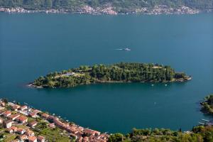an island in the middle of a large body of water at Casa Castellana Apt 1 e Casa Castellana Apt 2 in Sala Comacina