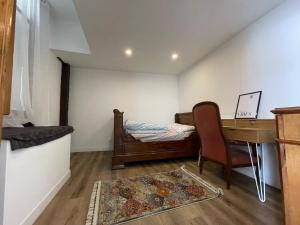 Postel nebo postele na pokoji v ubytování chambre cosy privée chez Franck + 3 fotografie