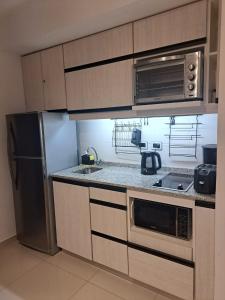 Una cocina o kitchenette en Divino departamento con garage