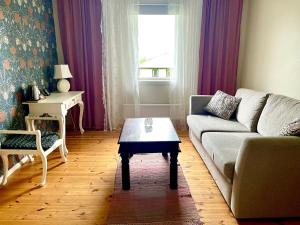 Posezení v ubytování Klimpfjällsgården Hotel & Restaurant