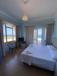 Hotel Borgo Cacciatori客房内的一张或多张床位