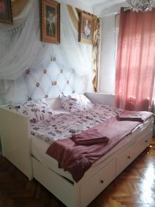 Posteľ alebo postele v izbe v ubytovaní Hortenzia apartman