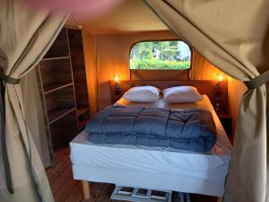 Le Vallon aux merlettes客房内的一张或多张床位