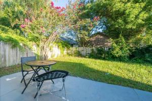 a table and two chairs on a patio at Orlando getaway in Orlando