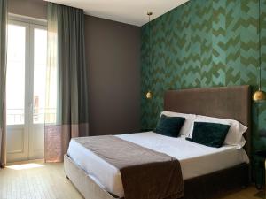 Postel nebo postele na pokoji v ubytování Re Sale Boutique Hotel + 37 fotografií